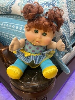 Cute Teal & Yellow Plush Baby Doll with Green Eyes